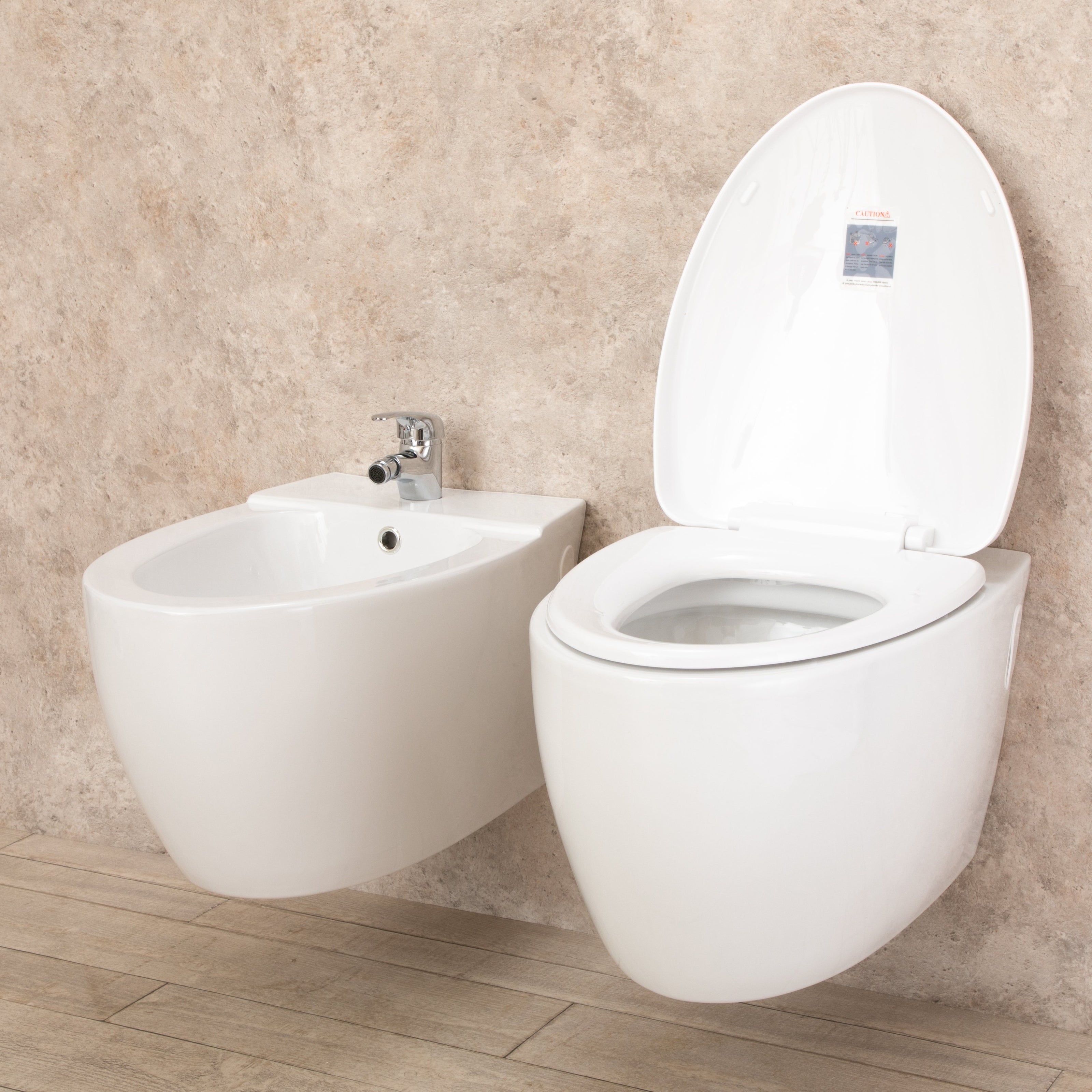 Sanitari Bagno Round Sospesi con Sedile a chiusura Rallenta e Bidet