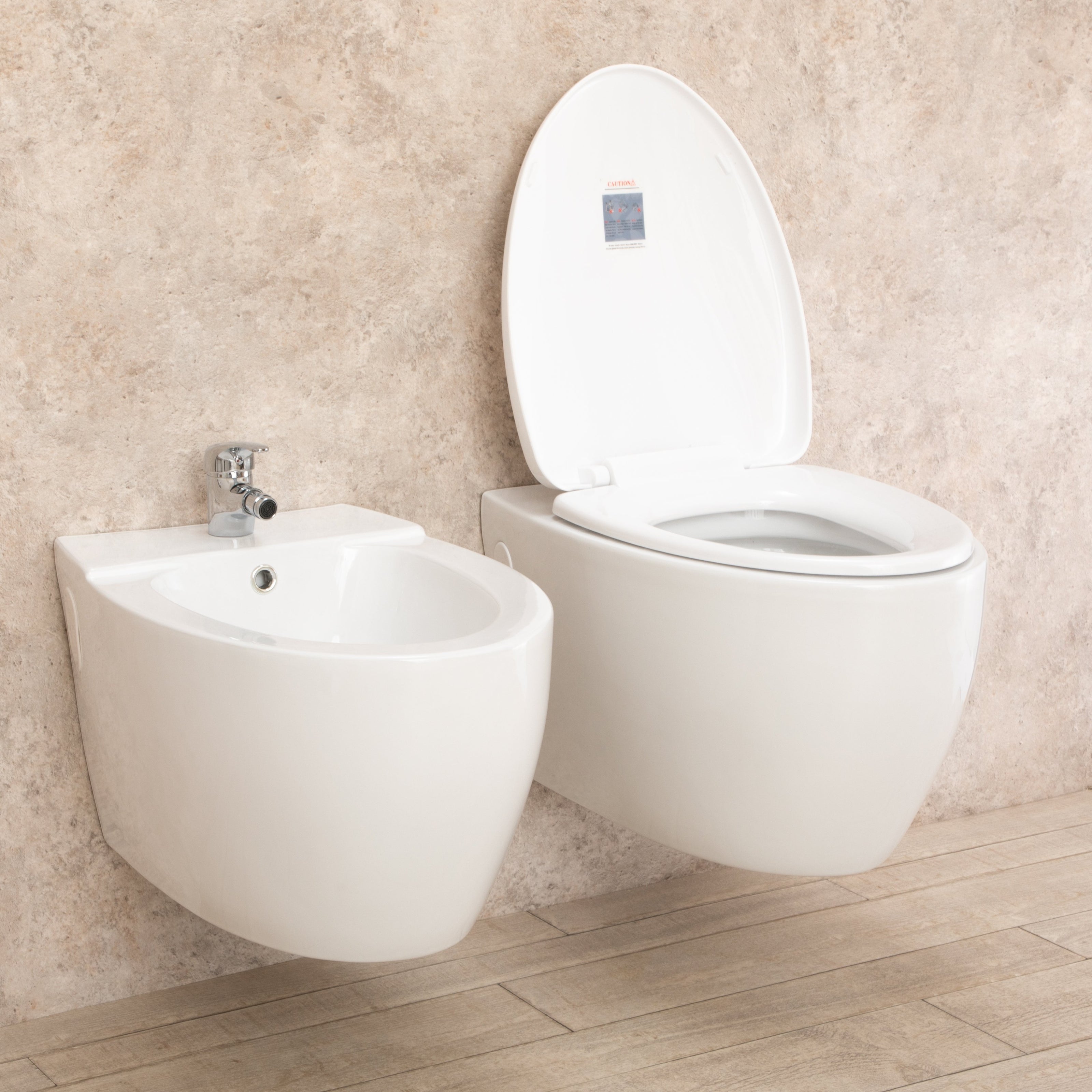 Sanitari Bagno Round Sospesi con Sedile a chiusura Rallenta e Bidet
