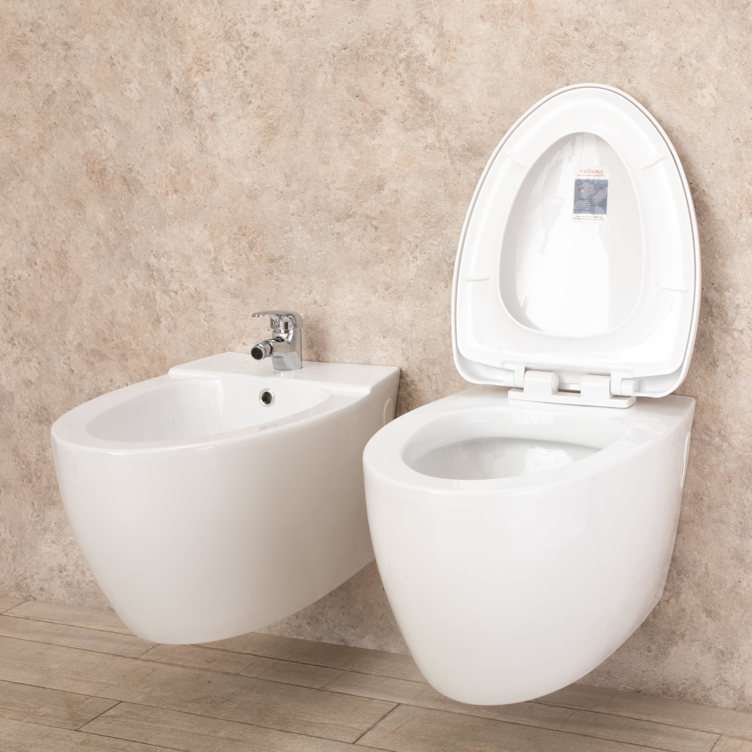 Sanitari Bagno Round Sospesi con Sedile a chiusura Rallenta e Bidet