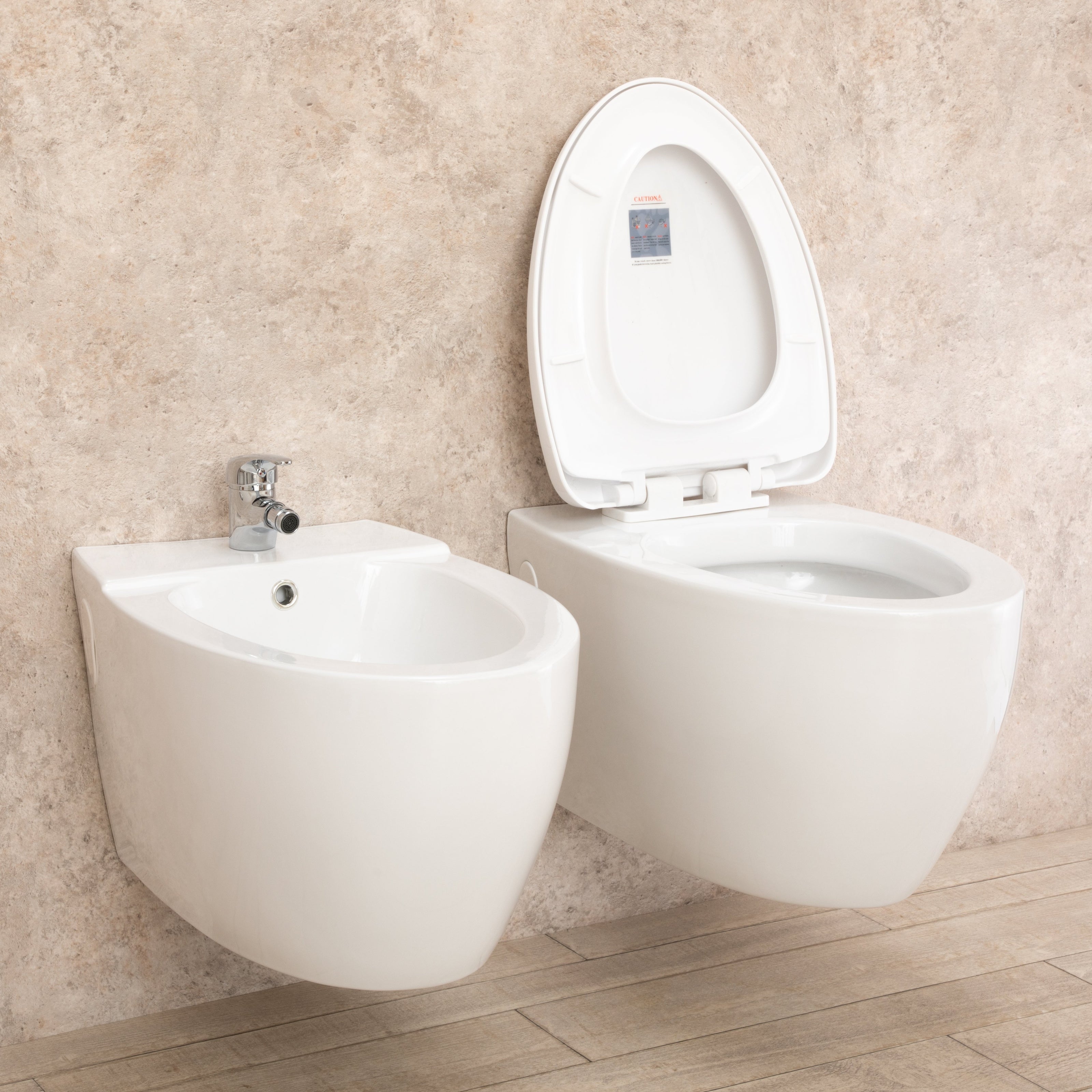 Sanitari Bagno Round Sospesi con Sedile a chiusura Rallenta e Bidet