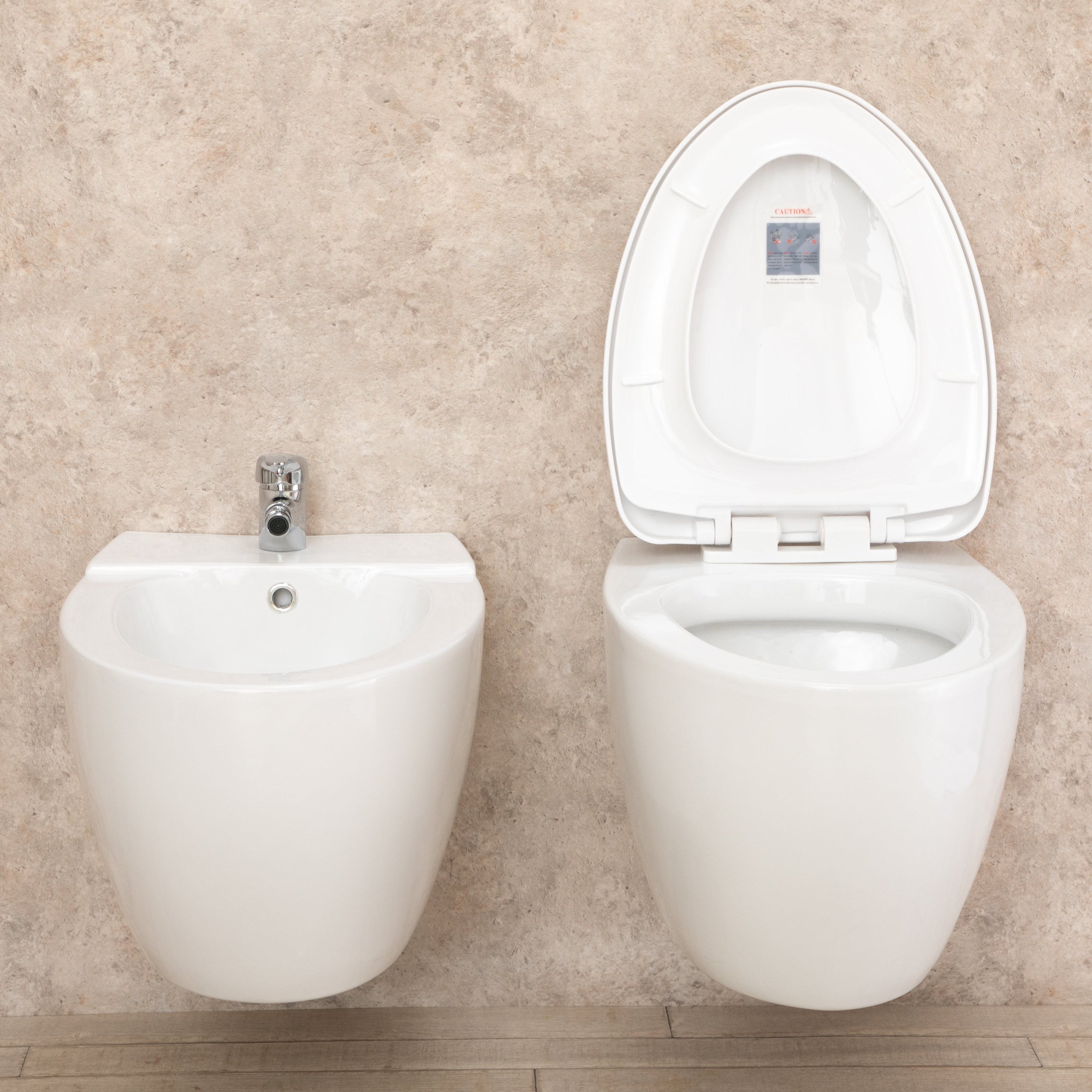 Sanitari Bagno Round Sospesi con Sedile a chiusura Rallenta e Bidet