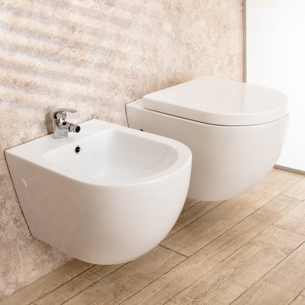 Sanitari Sospesi Vortix in Ceramica Wc senza brida Tavoletta e Bidet
