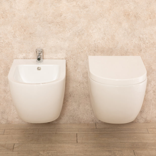 Sanitari Sospesi Vortix in Ceramica Wc senza brida Tavoletta e Bidet