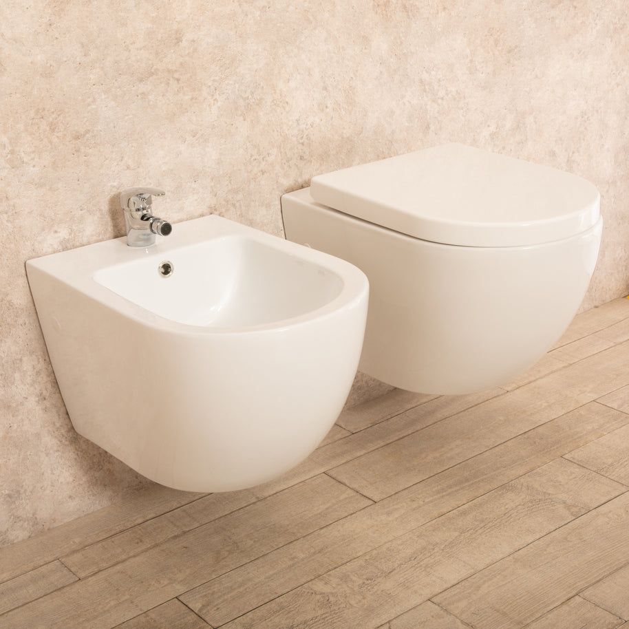 Sanitari Sospesi Vortix in Ceramica Wc senza brida Tavoletta e Bidet