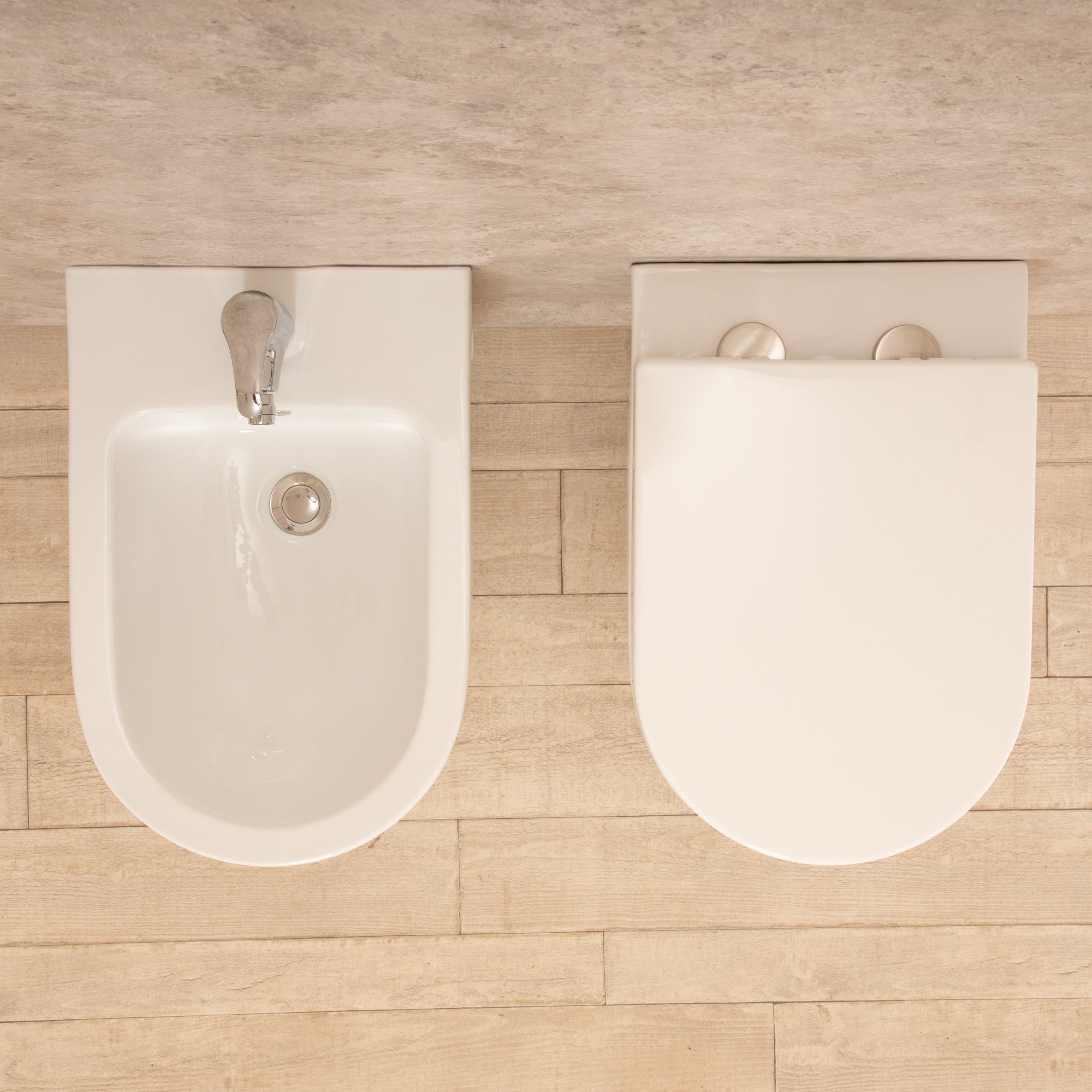 Sanitari Sospesi Vortix in Ceramica Wc senza brida Tavoletta e Bidet