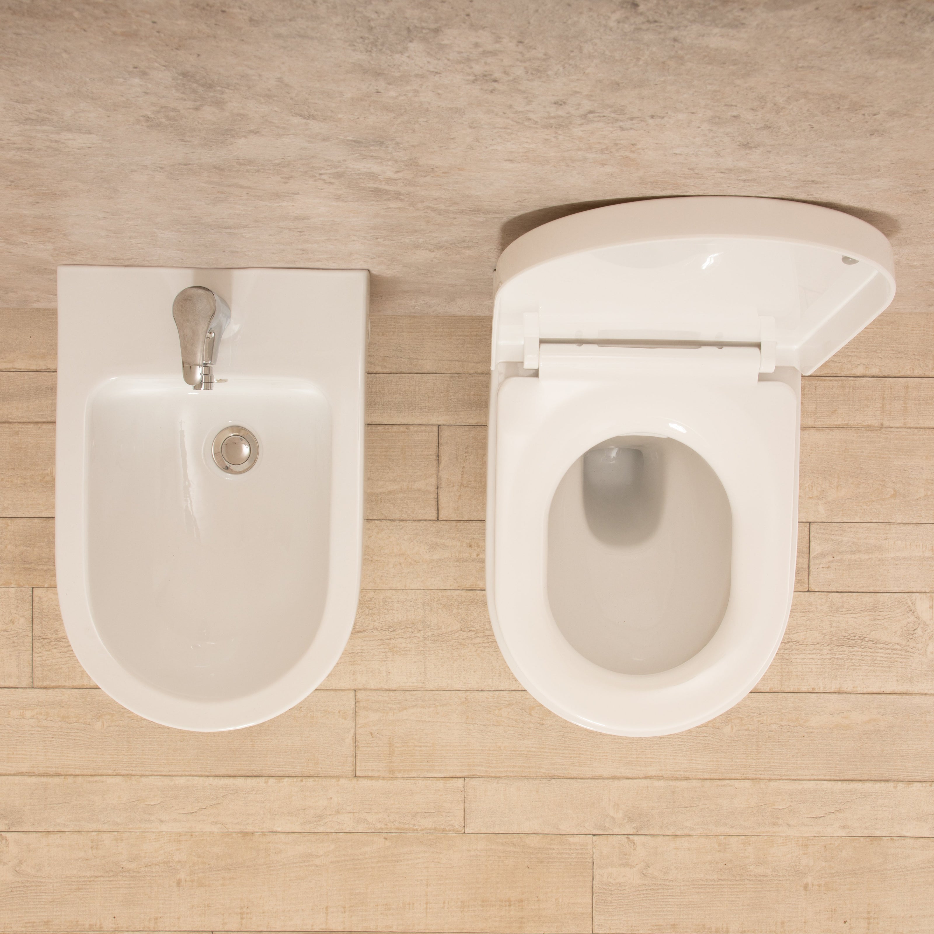 Sanitari Sospesi Vortix in Ceramica Wc senza brida Tavoletta e Bidet