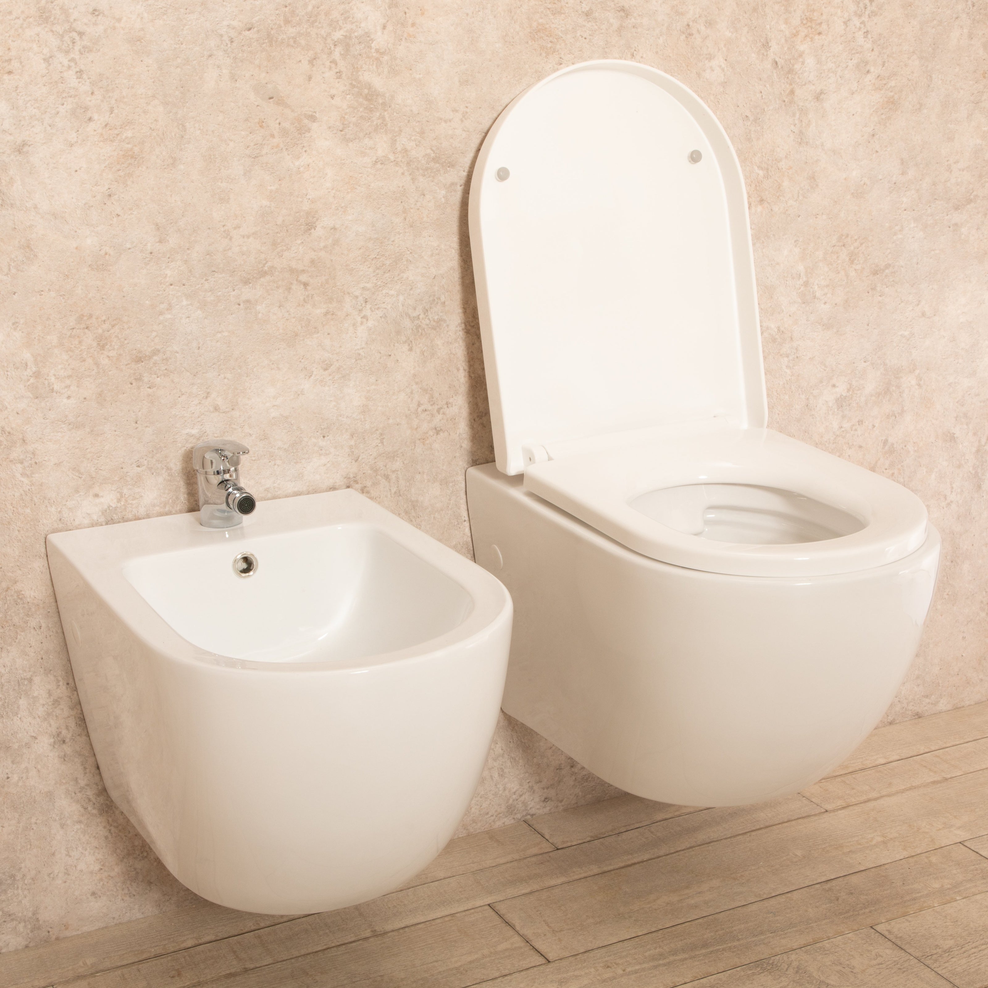 Sanitari Sospesi Vortix in Ceramica Wc senza brida Tavoletta e Bidet