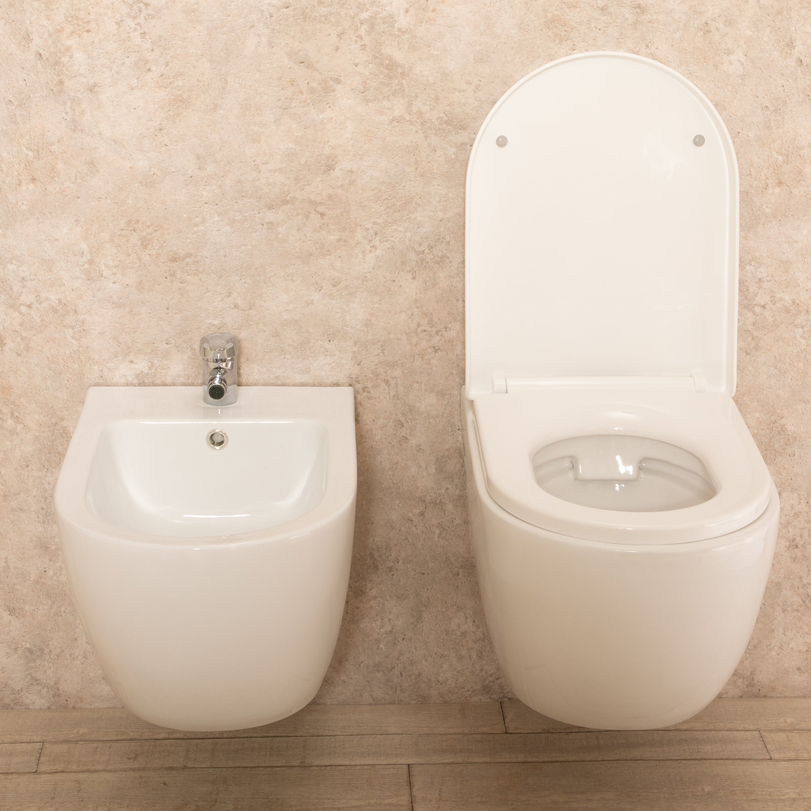 Sanitari Sospesi Vortix in Ceramica Wc senza brida Tavoletta e Bidet