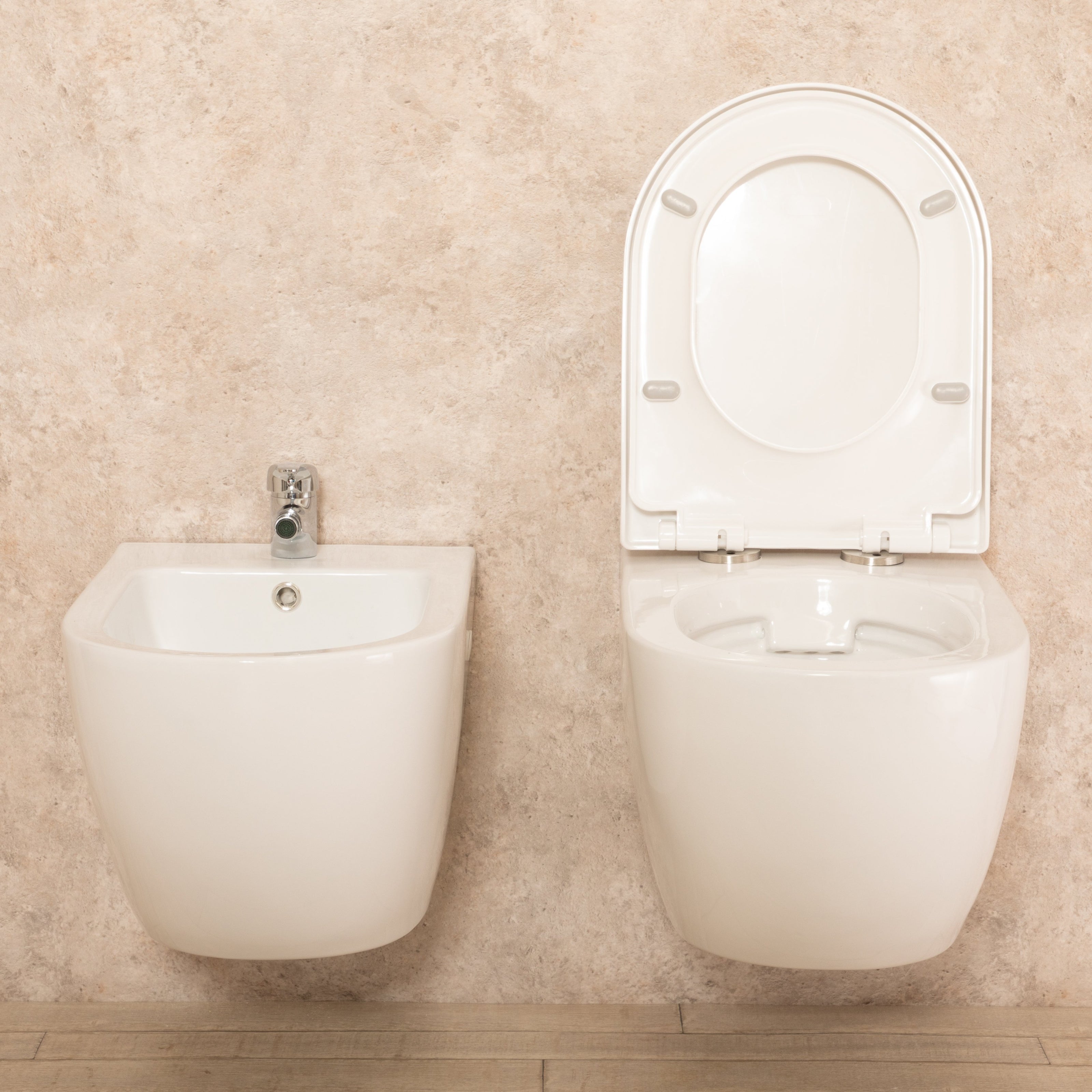 Sanitari Sospesi Vortix in Ceramica Wc senza brida Tavoletta e Bidet