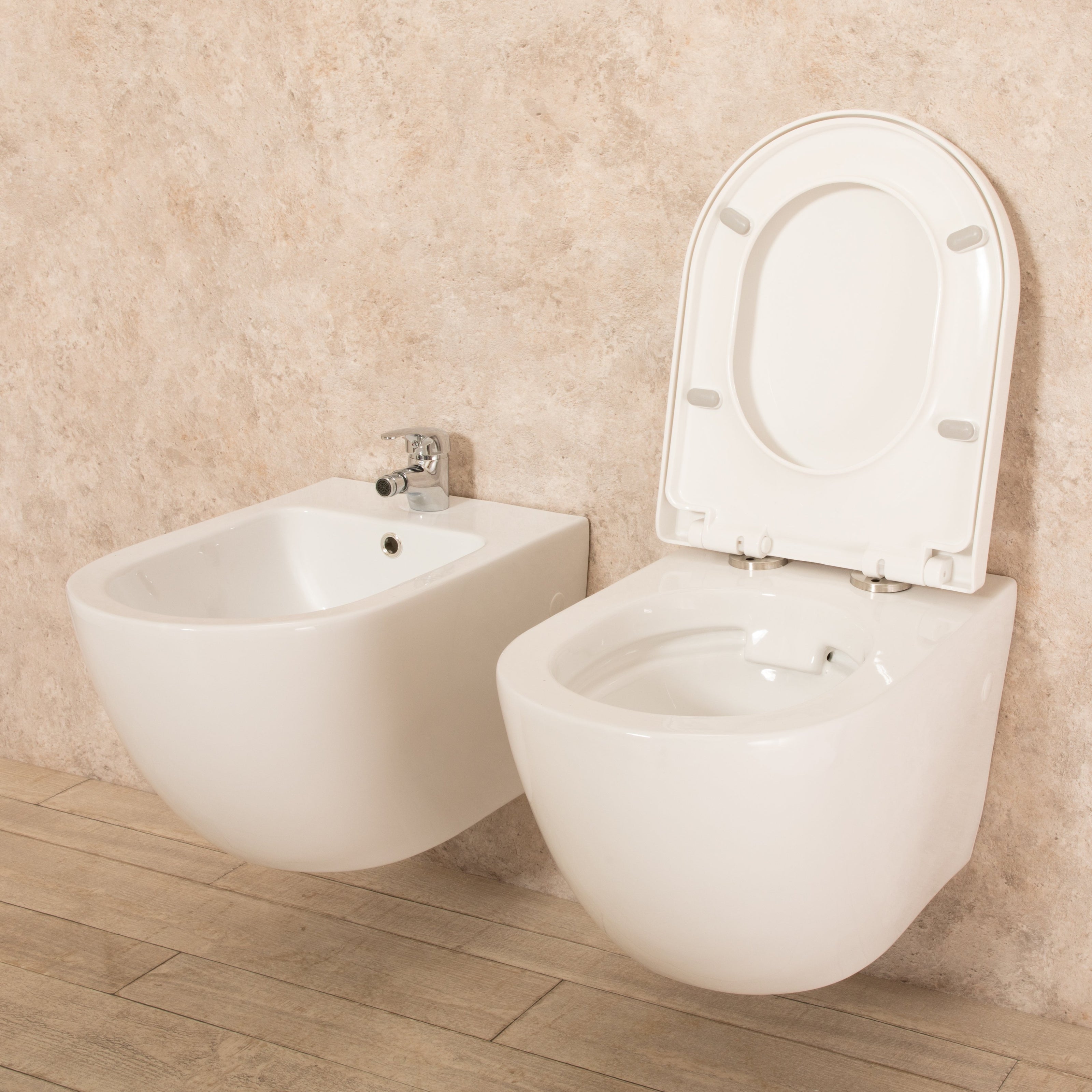 Sanitari Sospesi Vortix in Ceramica Wc senza brida Tavoletta e Bidet