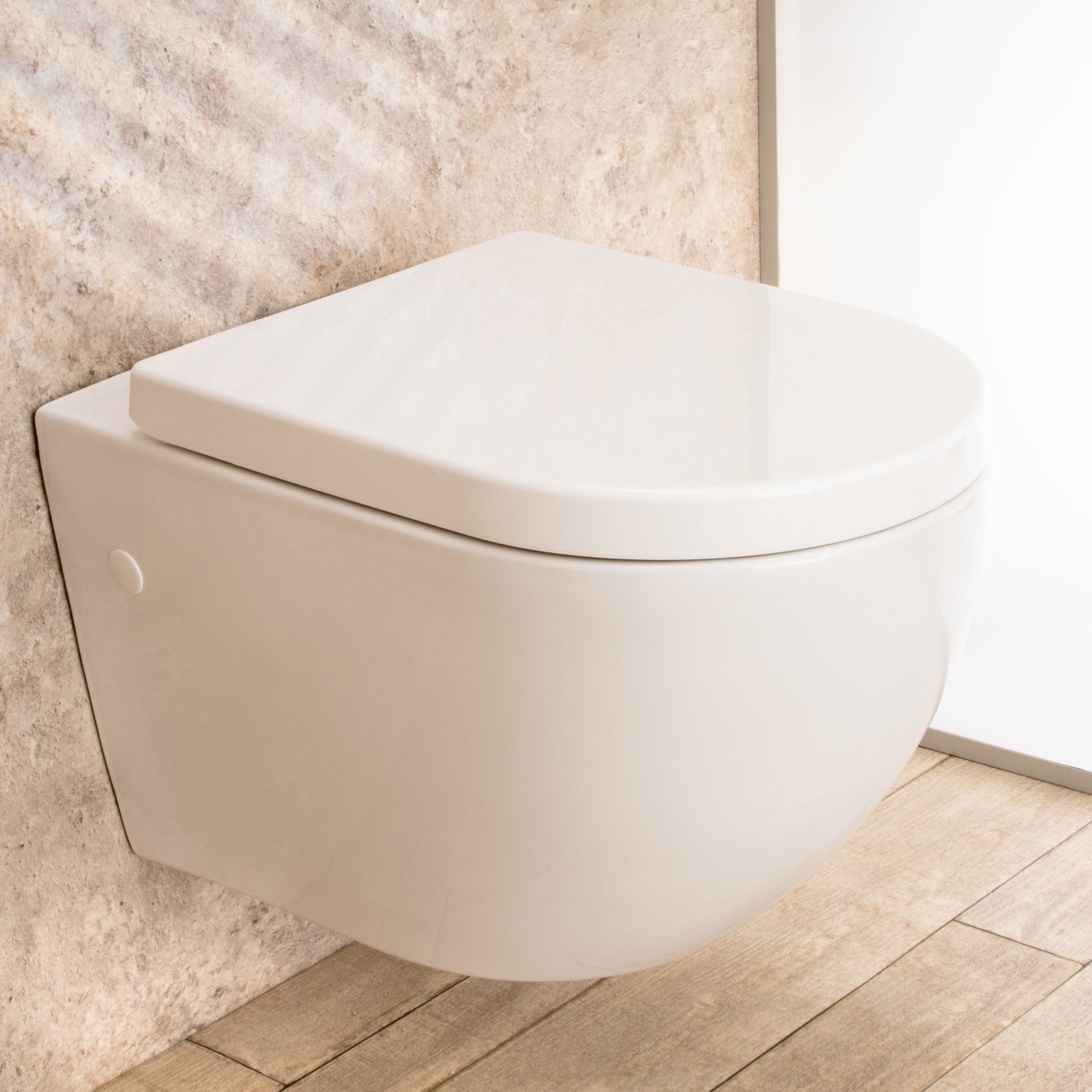 WC Sospeso Vortix in ceramica senza brida con copri vaso L36xP55xA33cm