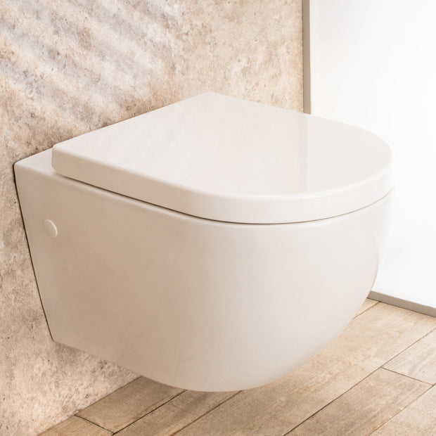 WC Sospeso Vortix in ceramica senza brida con copri vaso L36xP55xA33cm