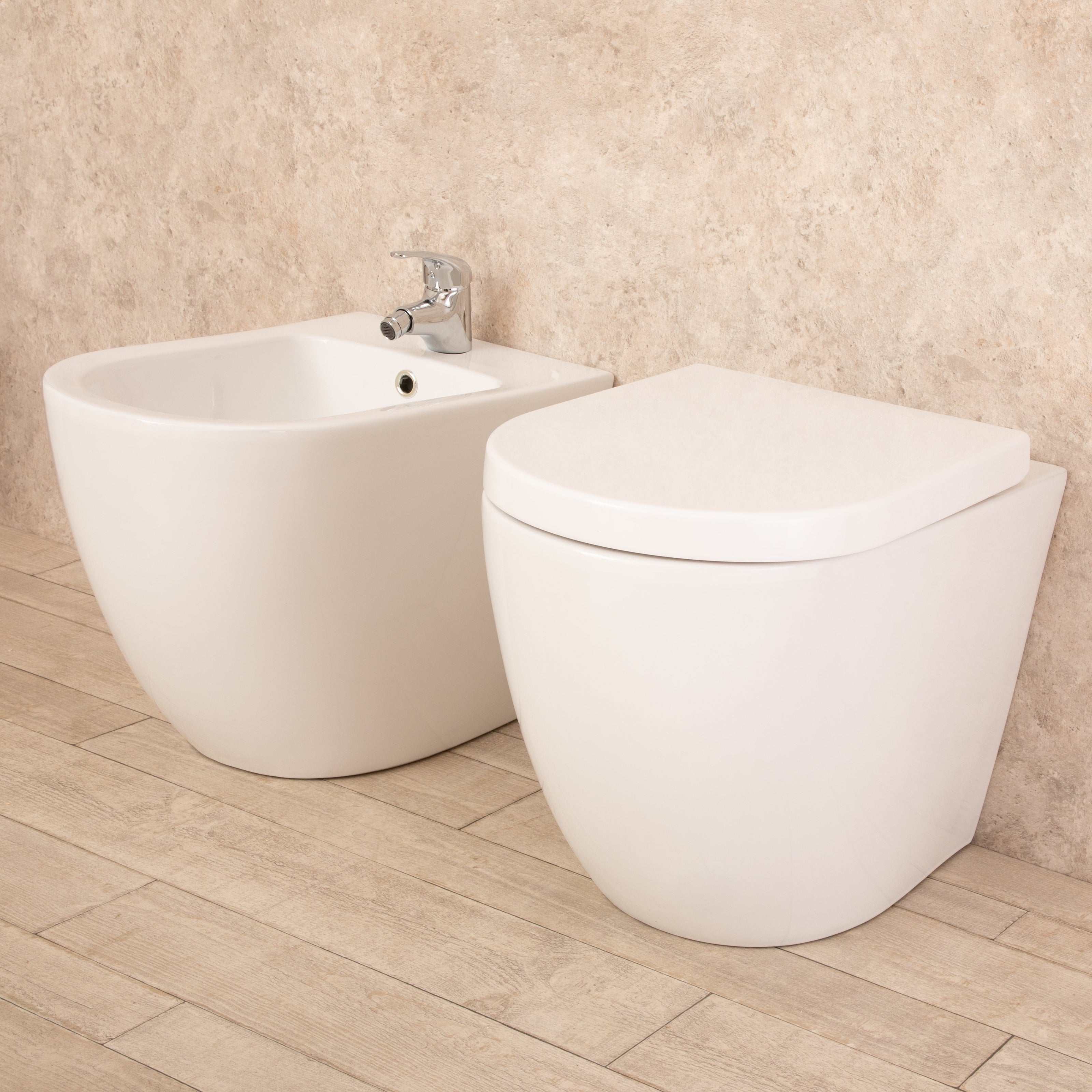 Sanitari Filo Parete Vortix WC senza brida con Seduta e Bidet