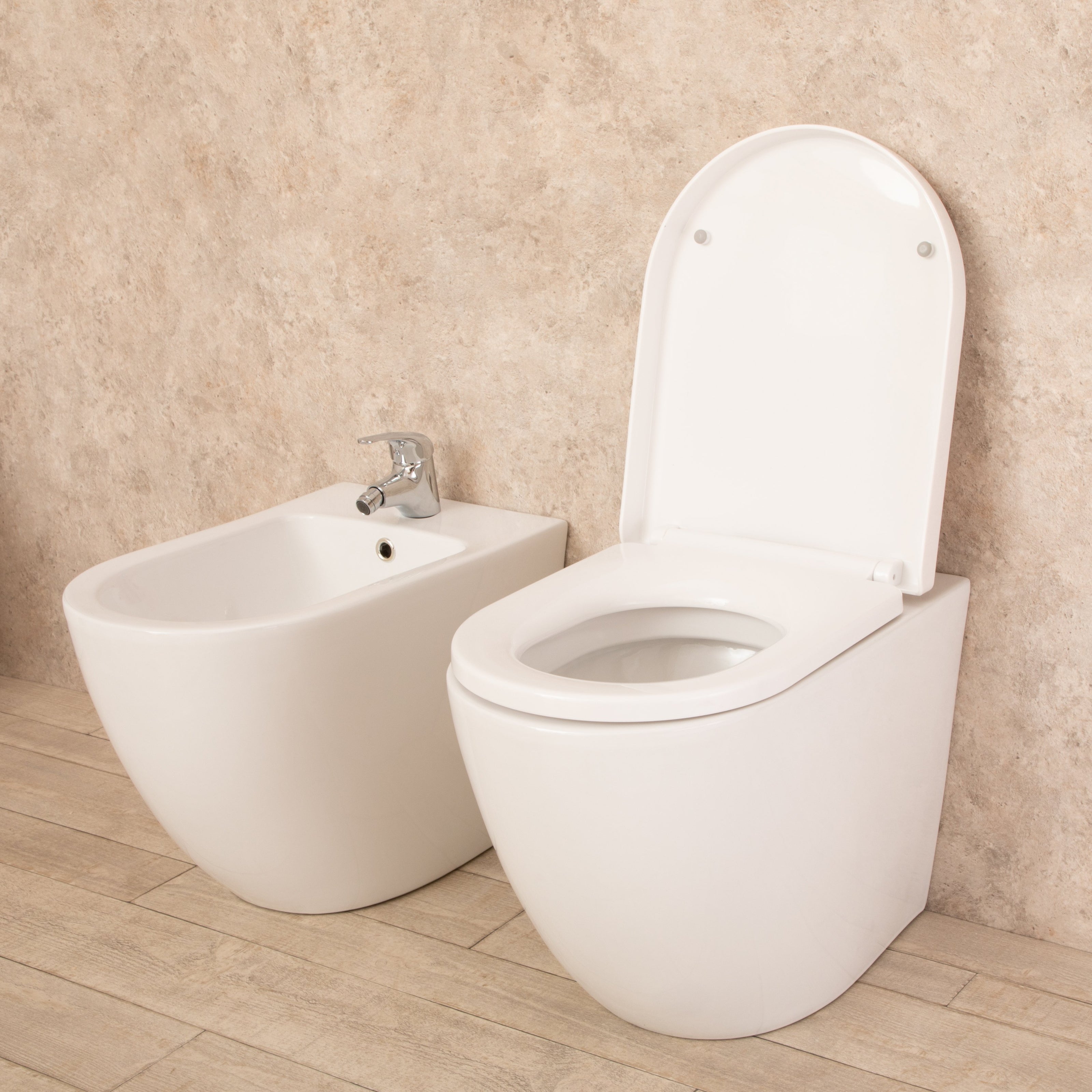 Sanitari Filo Parete Vortix WC senza brida con Seduta e Bidet