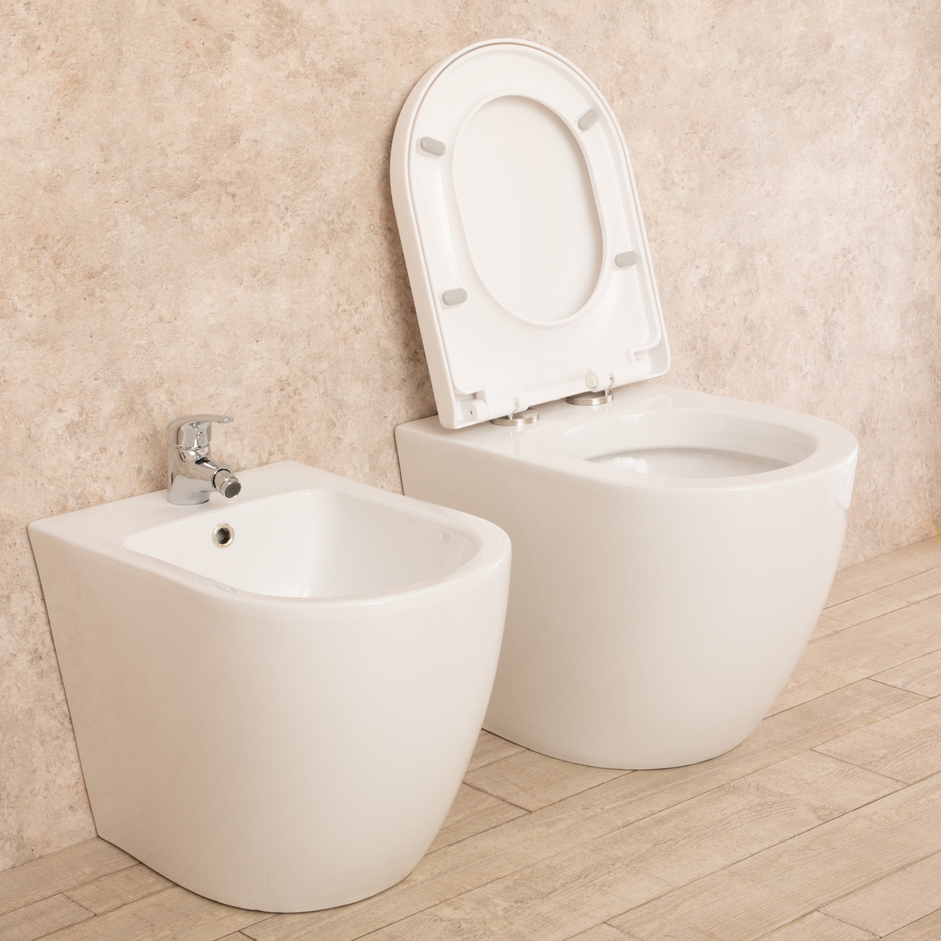 Sanitari Filo Parete Vortix WC senza brida con Seduta e Bidet